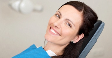Smiling woman after getting a dental crown with CEREC Primemill in Odessa 