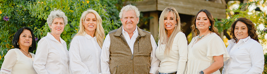 Odessa Dentist Dr. Steve Cobb & his team smiling for a photo