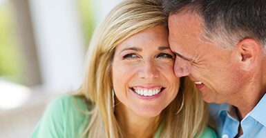 Couple in their mid-30’s smiling