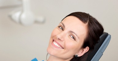 Woman smiling in the dental chair