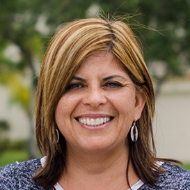 Woman with hair highlights smiling