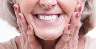 Woman showing dentures