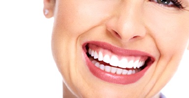 A woman’s beautiful smile after a visit to a cosmetic dentist in Odessa 