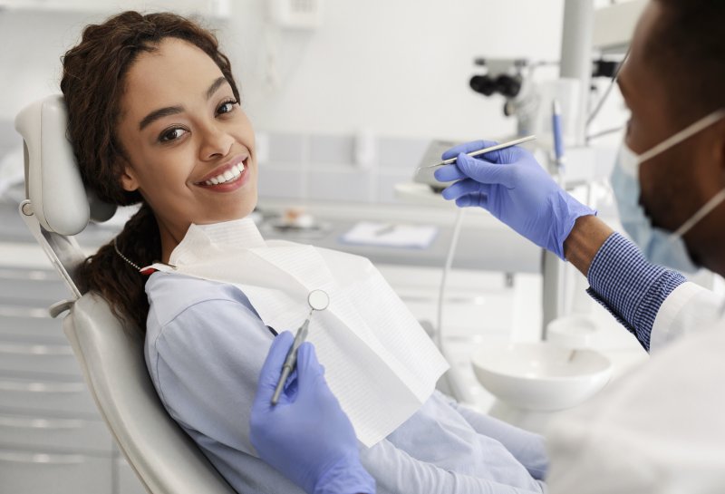 woman visiting dentist for a checkup