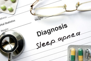 Diagnosis form with “sleep apnea” written on it